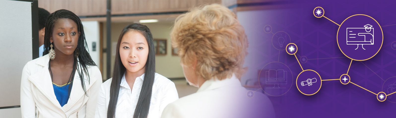 Students talking to teacher